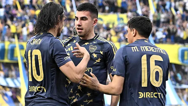 Cavani y Battaglia, a la par del grupo. (Getty)