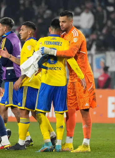 Pol Fernández y Sergio Romero en Boca (Imago)