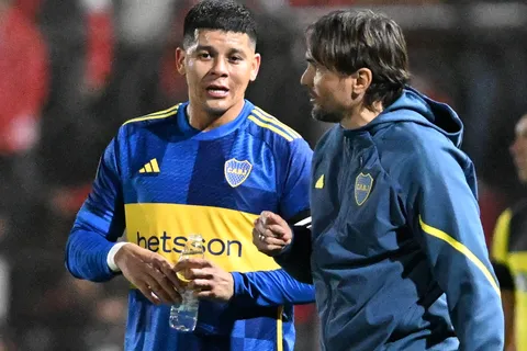 Diego Martínez y Marcos Rojo en Boca
