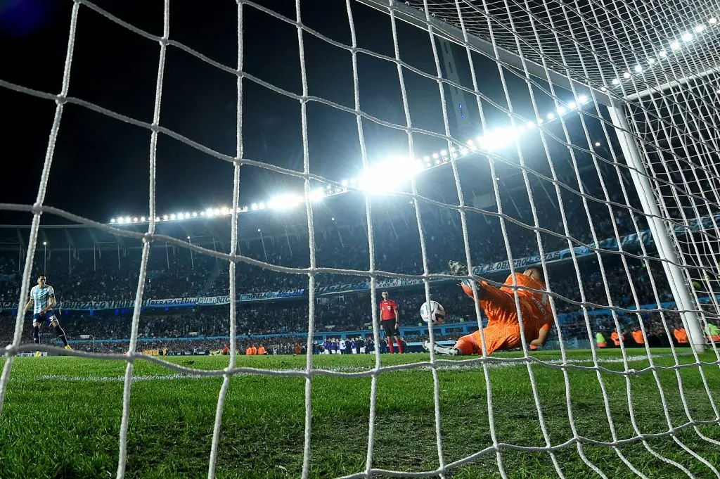AVELLANEDA, ARGENTINA – AUGUST 30: (EDITORS NOTE: In this photo taken from a remote camera from behind the goal.) Goalkeeper Sergio Romero of Boca Juniors saves a penalty in the shoot-out during a second leg quarter final match between Racing Club and Boca Juniors as part of Copa CONMEBOL Libertadores 2023 at Presidente Peron Stadium on August 30, 2023 in Avellaneda, Argentina. (Photo by Marcelo Endelli/Getty Images)