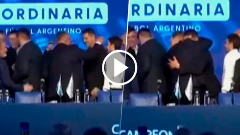 El abrazo de Román cn Chiqui Tapia.