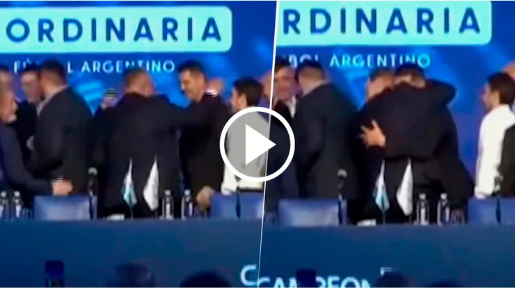 El abrazo de Román cn Chiqui Tapia.