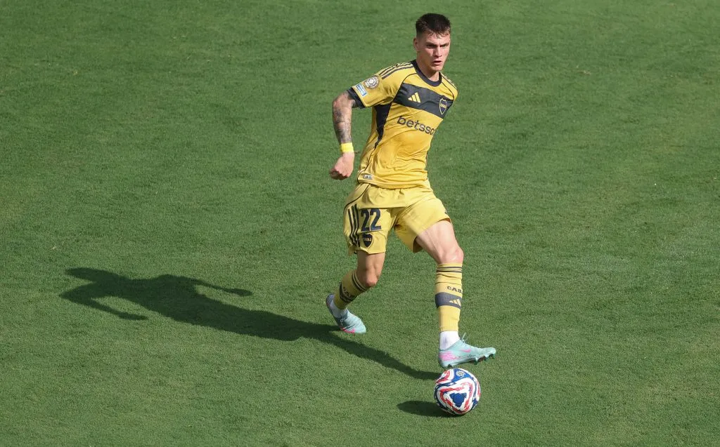 Kevin Zenón, respaldado por Miguel Russo. (Getty)
