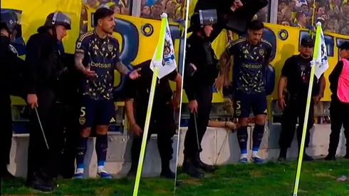 Dos hinchas tocaron a Paredes en el córner.