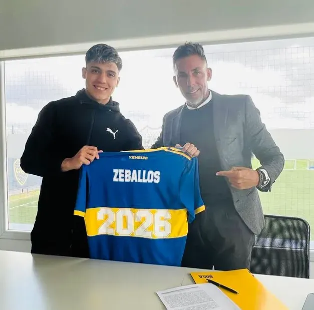 Zeballos y Diego Merino, su representante.